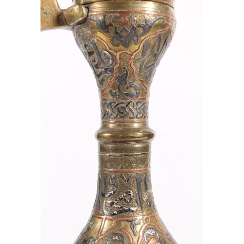 508 - Islamic Mamluk Revival type copper and silver inlaid brass coffee pot with Arabic script, 42cm tall ... 