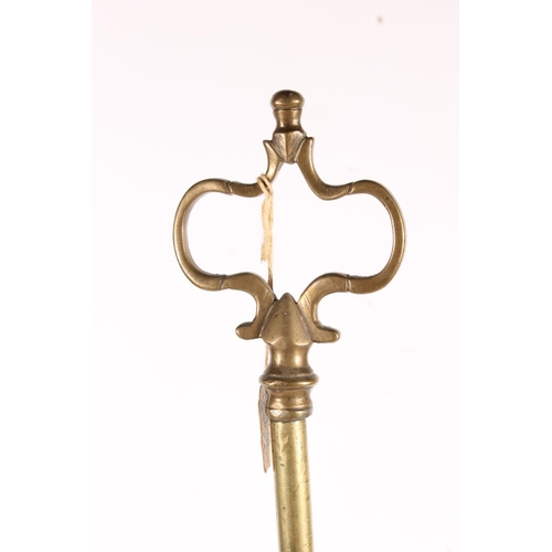 509 - Unusual Anglo Indian brass four light rush oil lamp with all over incised floral pattern, 67cm tall.