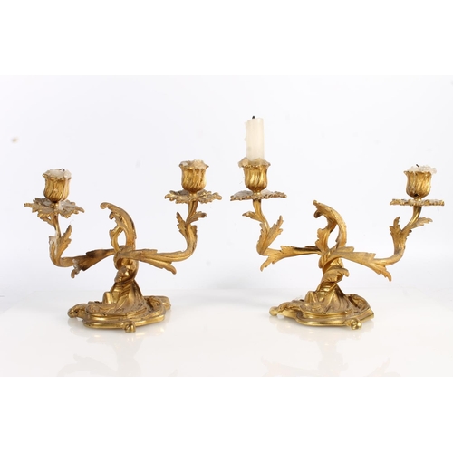 510 - Pair of French style gilt metal ormolu style two branch candleholders with acanthus leaf design, 27c... 