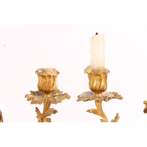 510 - Pair of French style gilt metal ormolu style two branch candleholders with acanthus leaf design, 27c... 