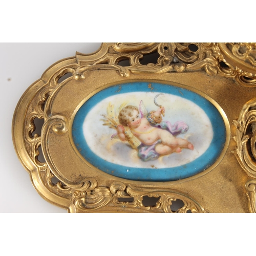 512 - French gilt metal ormolu style deskstand in the Rococo style inset with Sèvres style porcelai... 