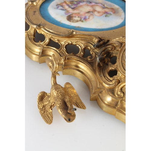 512 - French gilt metal ormolu style deskstand in the Rococo style inset with Sèvres style porcelai... 