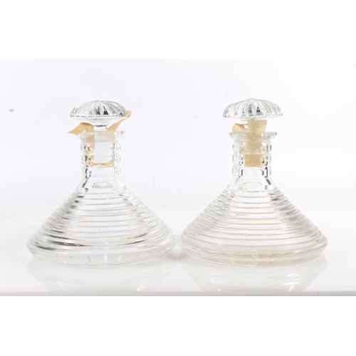 515 - Pair of antique glass ships decanters of stepped conical form with ridged mushroom stoppers, 20cm ta... 