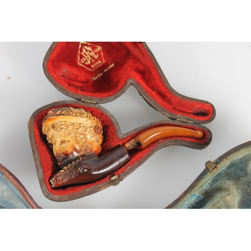 526 - Three antique letter seals with carved intaglio seals and four meerschaum smoking pipes.