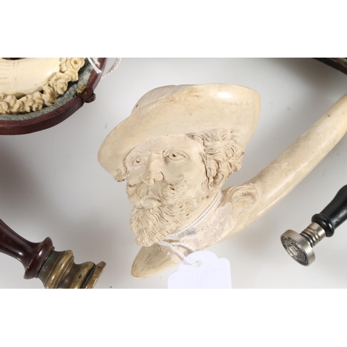 526 - Three antique letter seals with carved intaglio seals and four meerschaum smoking pipes.