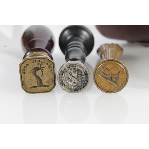 526 - Three antique letter seals with carved intaglio seals and four meerschaum smoking pipes.