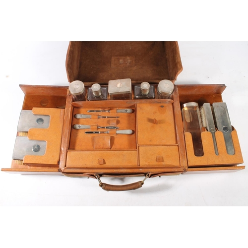 170 - Fine quality brown leather cased travelling dressing case having fully fitted interior with silver t... 