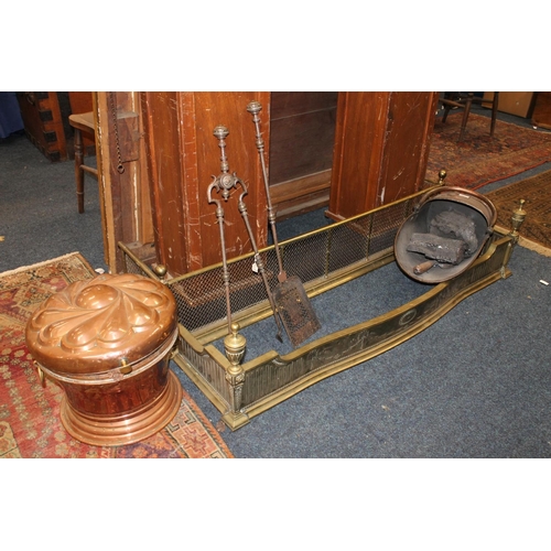 543 - Copper coal scuttle of helmet type. Copper log box. Two brass fenders and steel fire irons.