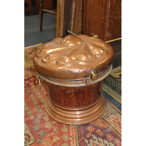 543 - Copper coal scuttle of helmet type. Copper log box. Two brass fenders and steel fire irons.