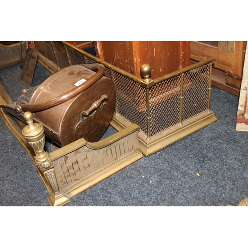 543 - Copper coal scuttle of helmet type. Copper log box. Two brass fenders and steel fire irons.