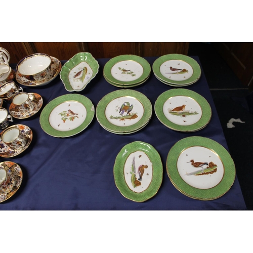 459 - 19th century porcelain dessert set with shagreen effect borders, the interior with bird and insect s... 