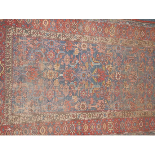 597 - Persian Bidjar rug with floral design, 184cm x 108cm.