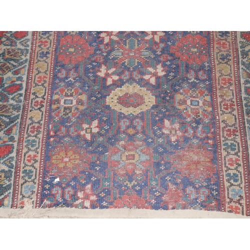 601 - Afghan runner having full length central strip flanked by multiple borders,  214cm x 110cm.