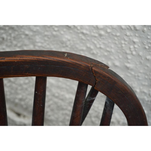 584 - Set of eight elm and oak Windsor type hoop back chairs.