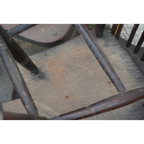 584 - Set of eight elm and oak Windsor type hoop back chairs.