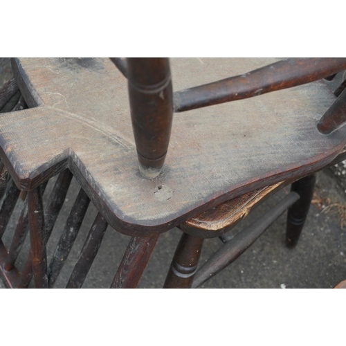 584 - Set of eight elm and oak Windsor type hoop back chairs.