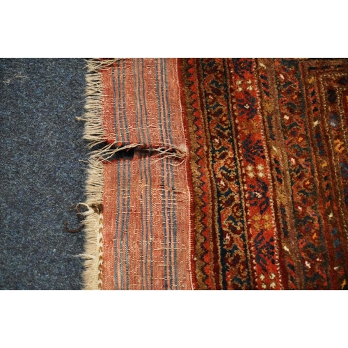 595 - Turkish multi bordered prayer rug, the central decoration on blue ground field,  142cm x 104cm.