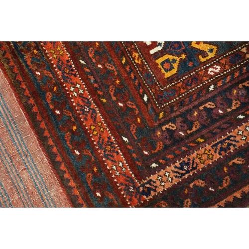 595 - Turkish multi bordered prayer rug, the central decoration on blue ground field,  142cm x 104cm.