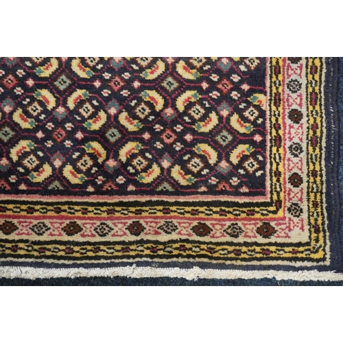 598 - Persian runner with all over geometric design, 383cm x 74cm.