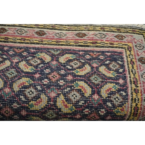 598 - Persian runner with all over geometric design, 383cm x 74cm.