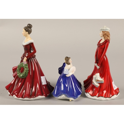 9 - Three Royal Doulton figurines to include Skating Season HN5675, Mistletoe and Wine HN5701, and Elain... 