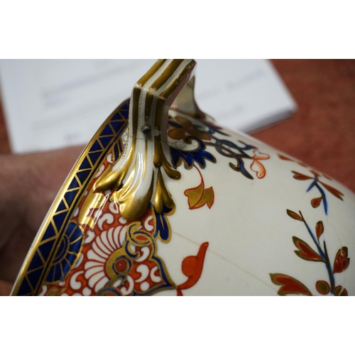 431 - Pair of Derby porcelain ice pails decorated in the Imari palate, 27cm tall.