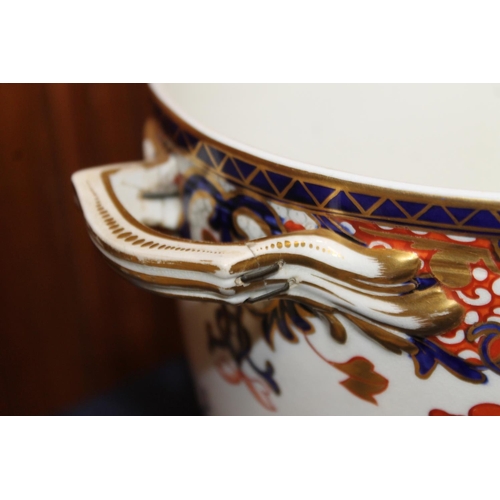 431 - Pair of Derby porcelain ice pails decorated in the Imari palate, 27cm tall.