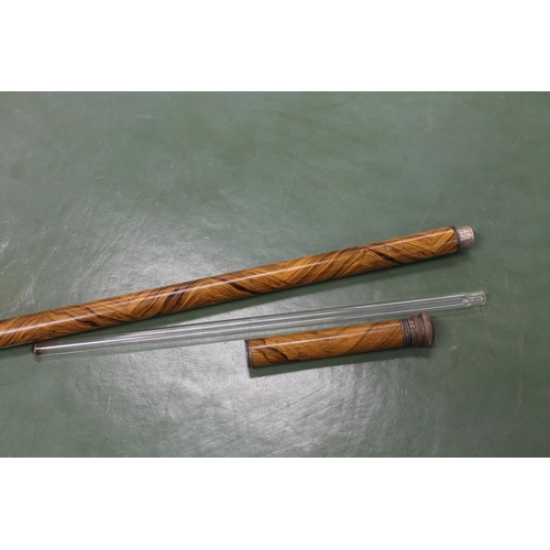 475 - White metal topped Malacca cane, another and a group of walking sticks.