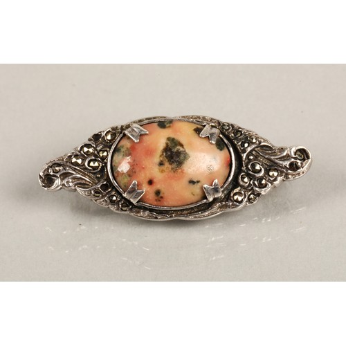 57 - Assorted brooches silver and gem set to include an orange gem set plaid brooch, a silver luckenbooth... 