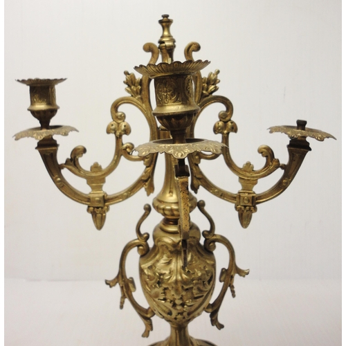 302 - French brass three-piece clock garniture in the Rococo taste, 20th century, comprising a large brack... 