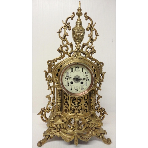 302 - French brass three-piece clock garniture in the Rococo taste, 20th century, comprising a large brack... 