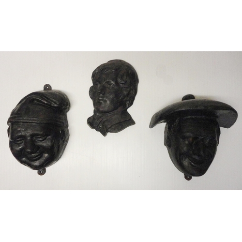 376 - Three painted cast iron exterior wall masks modelled as Robert Burns, Tam o' Shanter and Souter John... 