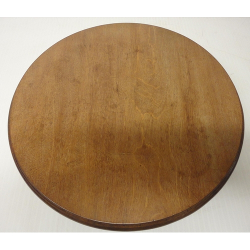 385 - Victorian mahogany lazy susan with moulded saucer top on turned base, 12cm high and 50.5cm diameter.