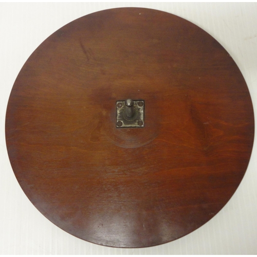 385 - Victorian mahogany lazy susan with moulded saucer top on turned base, 12cm high and 50.5cm diameter.