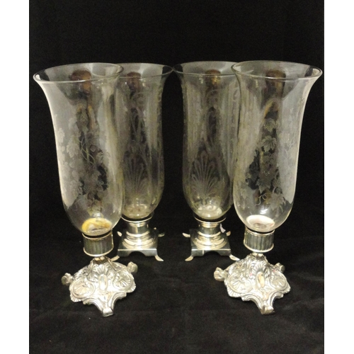 333 - Two pairs of glass trumpet vases decorated with applied Victorian-style scrolls and foliage, on whit... 