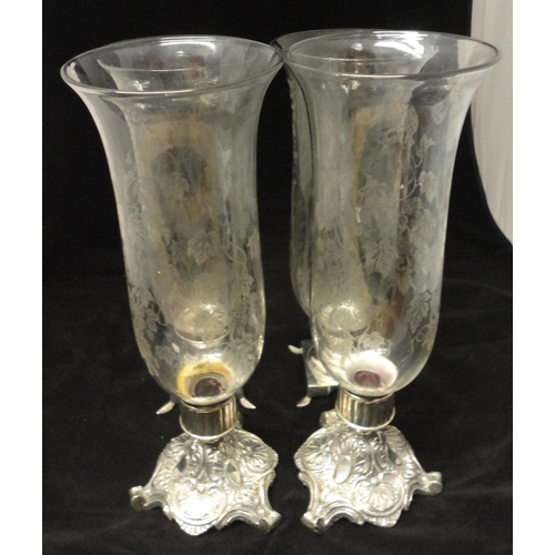 333 - Two pairs of glass trumpet vases decorated with applied Victorian-style scrolls and foliage, on whit... 