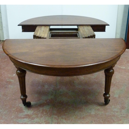 518 - Victorian mahogany circular extending dining table with one additional leaf, on six turned supports ... 