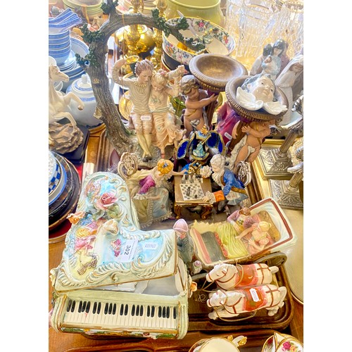 302 - Pair cherub candle holders, Capodimonte-style figure of man & woman, large piano figure, etc