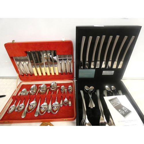 11 - Cosmos Debenhams 32 piece cutlery set and another canteen of cutlery.