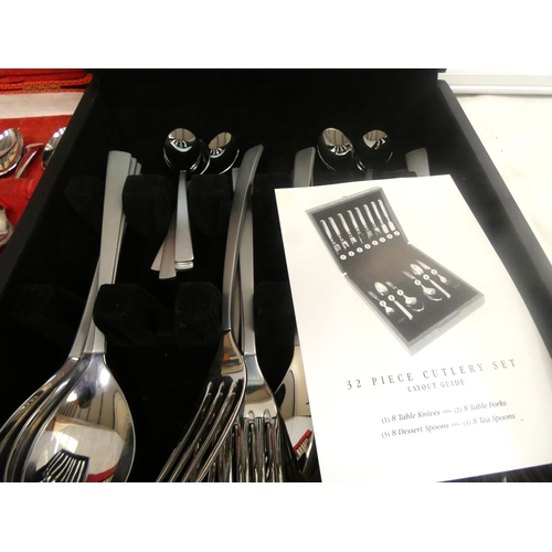 11 - Cosmos Debenhams 32 piece cutlery set and another canteen of cutlery.