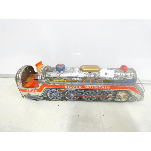 91 - Japanese tin plate silver mountain train. No3525