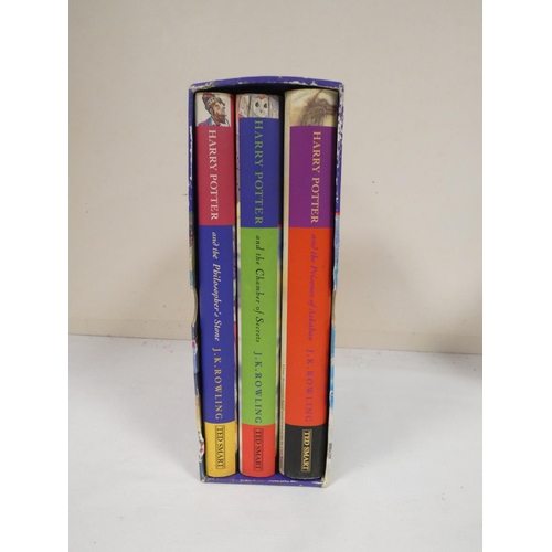 71 - ROWLING J. K.  Harry Potter trilogy in pictorial slip case. Each of the 3 vols. in unclipped d.w. co... 