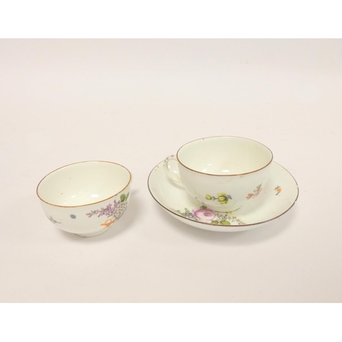 157 - Meissen porcelain trio comprising near matching tea cup, coffee cup and saucer, decorated with flora... 