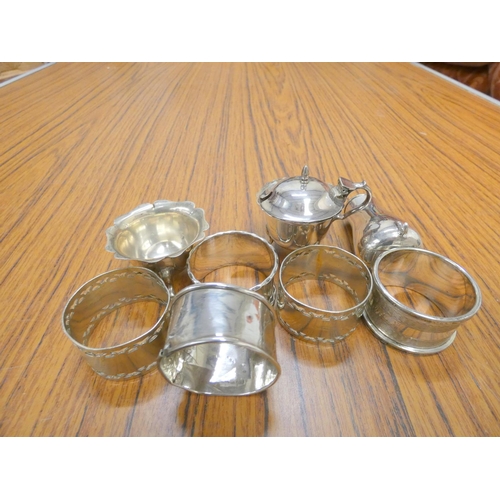 174 - Set of four epns napkin rings, boxed and other ep condiments.