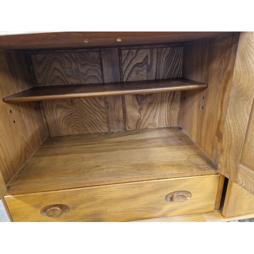 653 - Ercol sideboard 114cm w x 49cm d x 82cmh