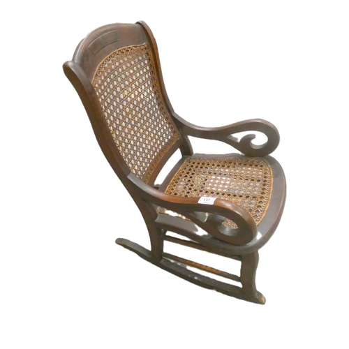 117 - Antique mahogany child's rocking chair.