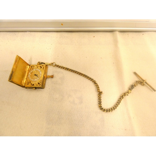 121 - Silver gilt vintage fob watch in the form of a book, weight 52g.