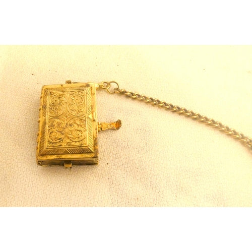 121 - Silver gilt vintage fob watch in the form of a book, weight 52g.