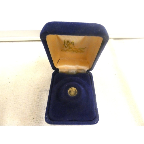 123 - Small gold 0.3gram South African 14ct gold coin.