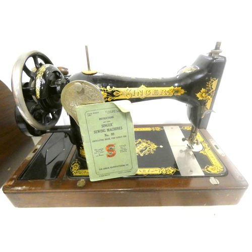 134 - Cased singer sewing machine, No99